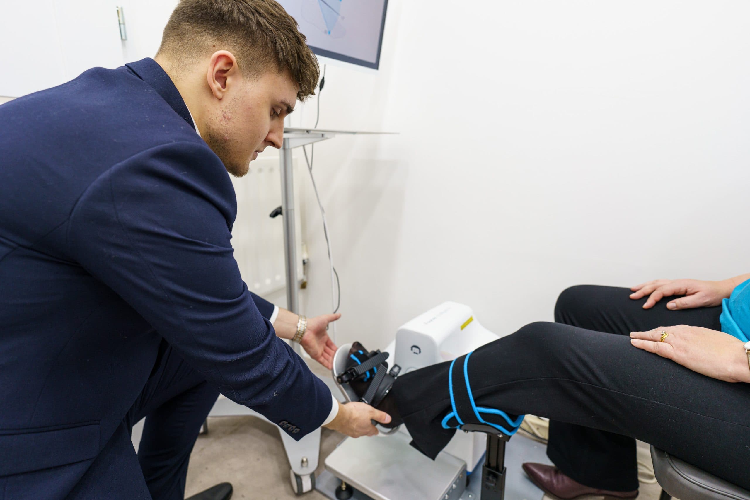 Patient working through structured knee rehabilitation